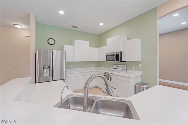 821 Carlfield AVE, Lehigh Acres, FL 33971