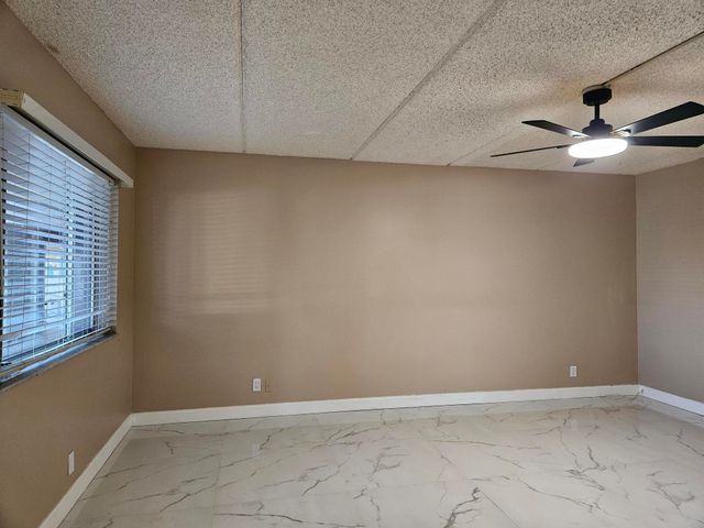 300 VILLAGE GREEN Circle S 114, Palm Springs, FL 33461