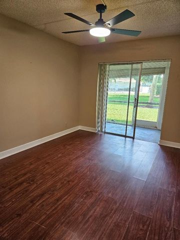 300 VILLAGE GREEN Circle S 114, Palm Springs, FL 33461