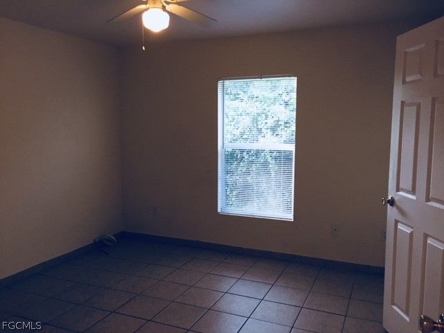 213 Ivan AVE S, Lehigh Acres, FL 33973