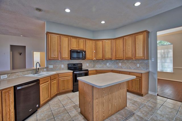 6715 Village Bridge Drive, Humble, TX 77346