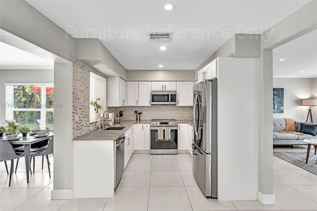 1577 NE 48th Ct, Oakland Park, FL 33334