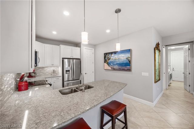 7658 Jacaranda LN, Naples, FL 34114