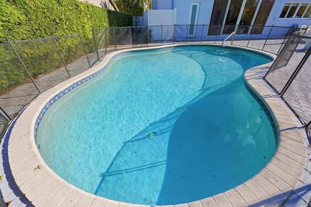 9001 N Lake Dasha Drive, Plantation, FL 33324