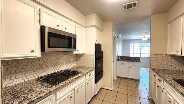 2702 Foliage Green Drive, Kingwood, TX 77339