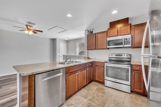 8677 MARTINSON STREET, Orlando, FL 32827