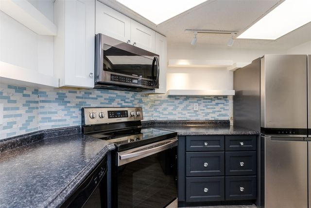 5590 Spring Valley Road F206, Dallas, TX 75254