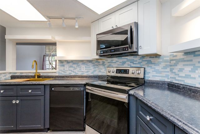 5590 Spring Valley Road F206, Dallas, TX 75254