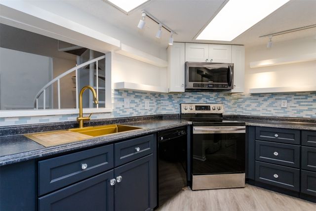 5590 Spring Valley Road F206, Dallas, TX 75254