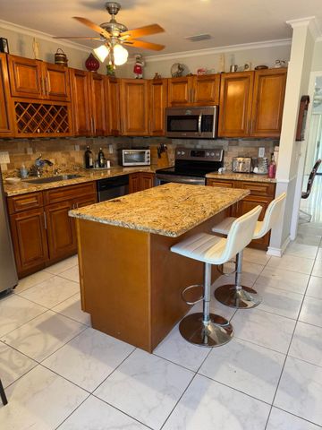 8588 BELLA VISTA Drive, Boca Raton, FL 33433