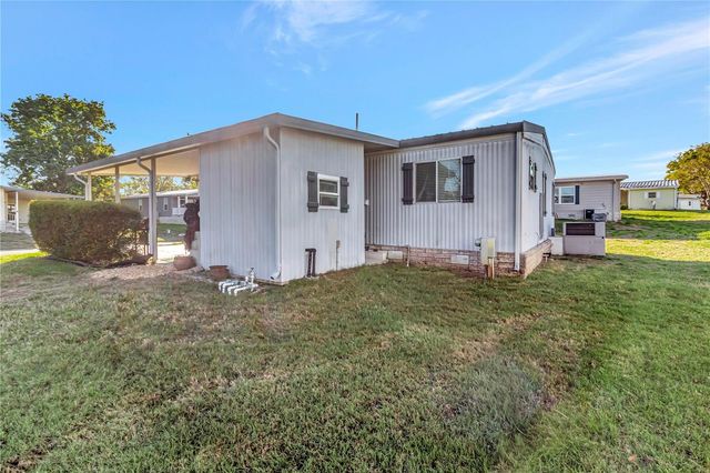 2236 EVERGREEN CIRCLE 1704, Zellwood, FL 32798