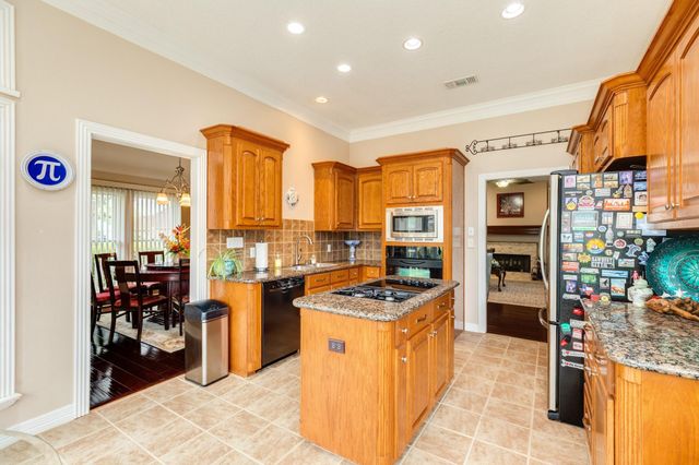 604 Enchanted Oaks Drive, Angleton, TX 77515