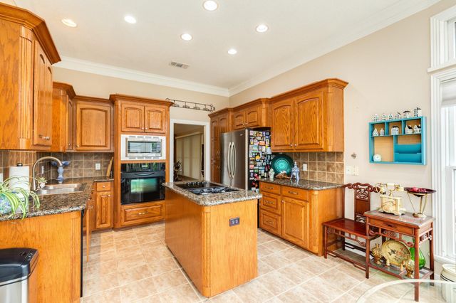 604 Enchanted Oaks Drive, Angleton, TX 77515