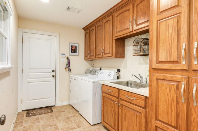 604 Enchanted Oaks Drive, Angleton, TX 77515