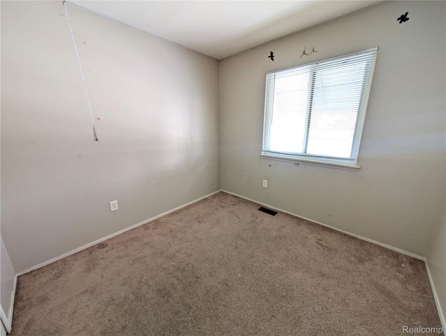 15630 Harrison, Romulus, MI 48174