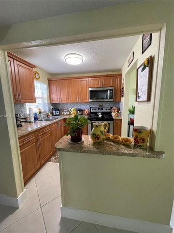 9041 Sunrise Lakes Boulevard 108, Sunrise, FL 33322