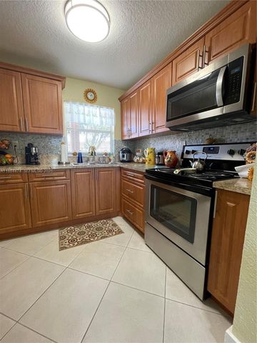 9041 Sunrise Lakes Boulevard 108, Sunrise, FL 33322