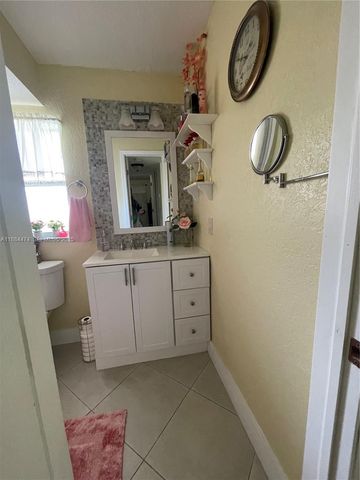 9041 Sunrise Lakes Boulevard 108, Sunrise, FL 33322