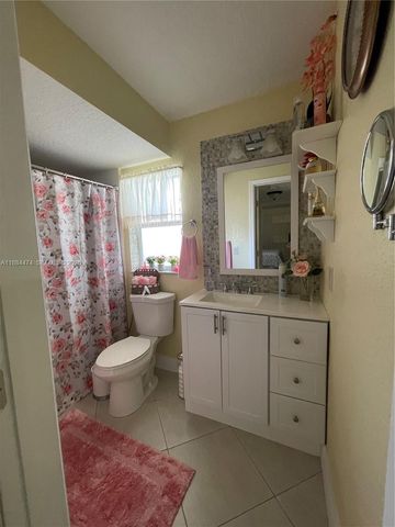 9041 Sunrise Lakes Boulevard 108, Sunrise, FL 33322