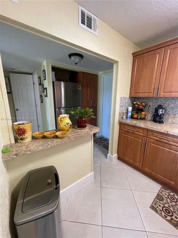 9041 Sunrise Lakes Boulevard 108, Sunrise, FL 33322