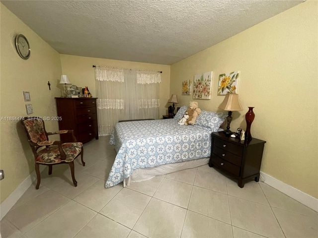 9041 Sunrise Lakes Boulevard 108, Sunrise, FL 33322