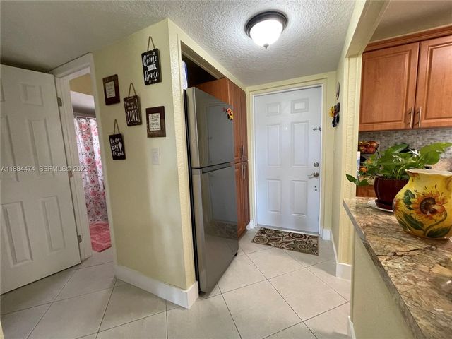 9041 Sunrise Lakes Boulevard 108, Sunrise, FL 33322