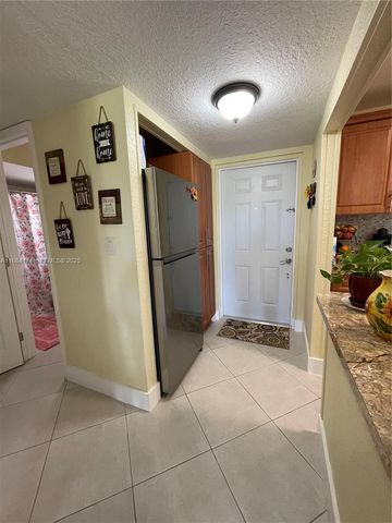 9041 Sunrise Lakes Boulevard 108, Sunrise, FL 33322