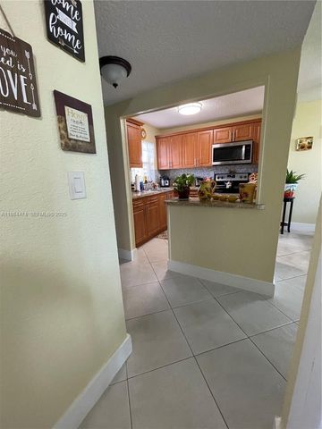 9041 Sunrise Lakes Boulevard 108, Sunrise, FL 33322