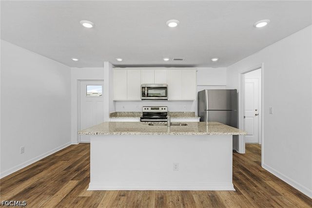 442 Burrstone DR, Lehigh Acres, FL 33974