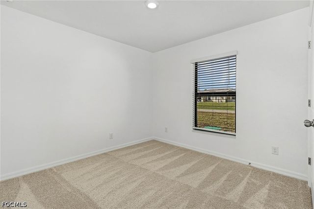 442 Burrstone DR, Lehigh Acres, FL 33974