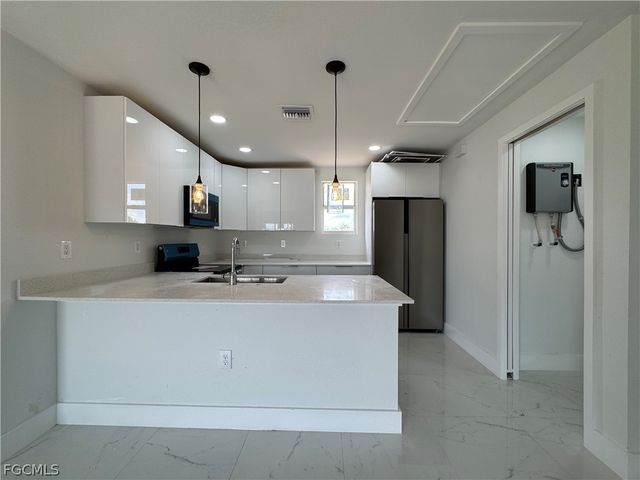 3015 4th ST SW, Lehigh Acres, FL 33976