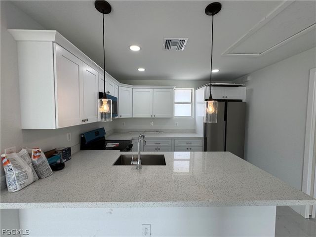 3015 4th ST SW, Lehigh Acres, FL 33976