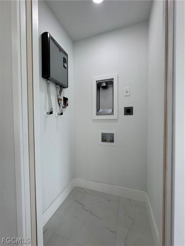 3015 4th ST SW, Lehigh Acres, FL 33976