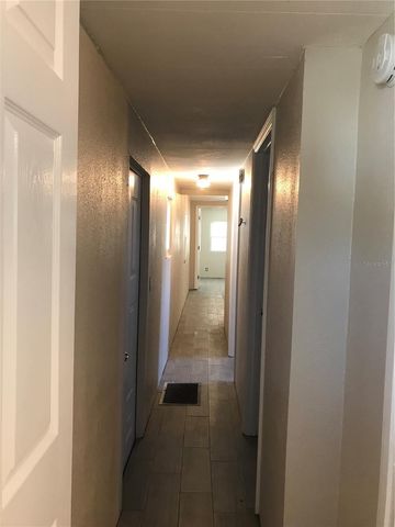 7037 LOFTY DRIVE, Port Richey, FL 34668