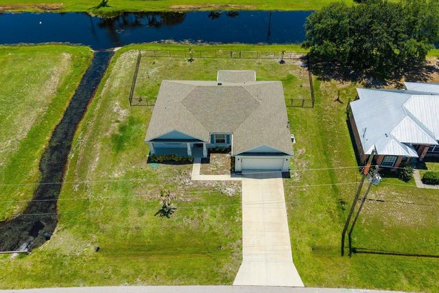 2063 SE South Buttonwood Drive, Port St. Lucie, FL 34952
