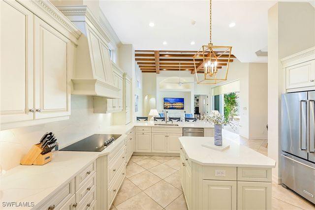 9155 Torrefino CT, Naples, FL 34109