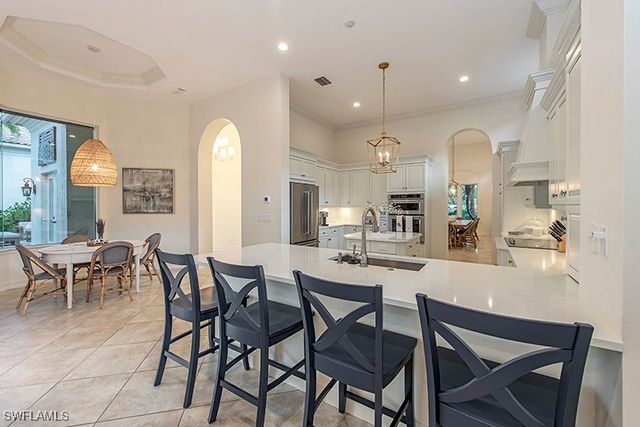 9155 Torrefino CT, Naples, FL 34109