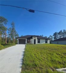 457 Woodman DR, Lehigh Acres, FL 33972