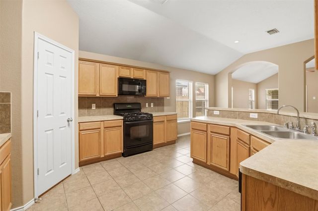 9618 Red Rugosa Drive, Houston, TX 77095