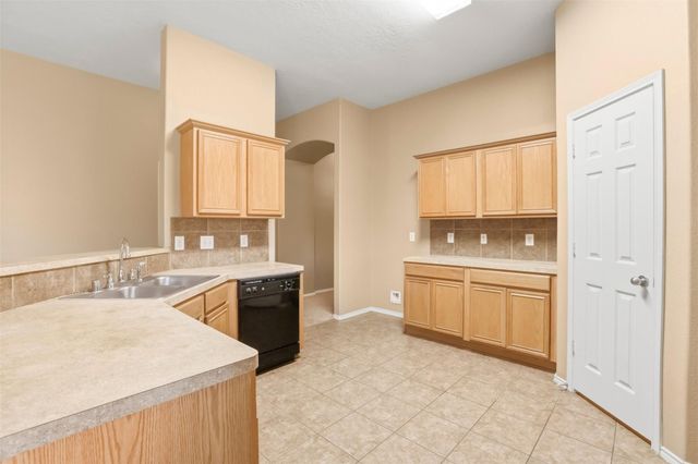 9618 Red Rugosa Drive, Houston, TX 77095