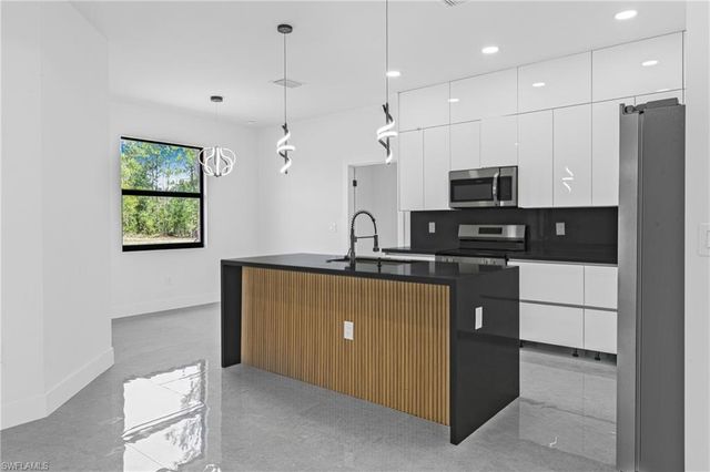 718 Bennington DR, Lehigh Acres, FL 33974