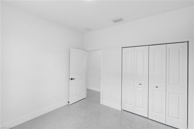 718 Bennington DR, Lehigh Acres, FL 33974