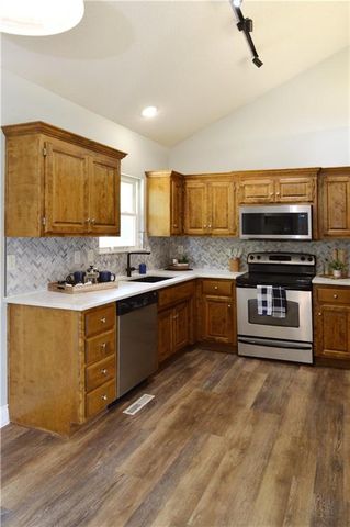 1409 NW NICHOLAS Drive, Grain Valley, MO 64029