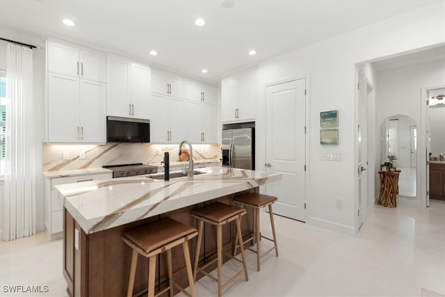 7315 Cayo Coco LN, Naples, FL 34113