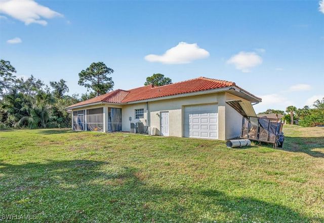 614 Jackson AVE, Lehigh Acres, FL 33972