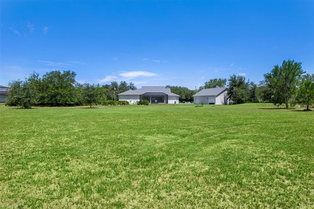 8408 WOODLEAF BOULEVARD, Wesley Chapel, FL 33544