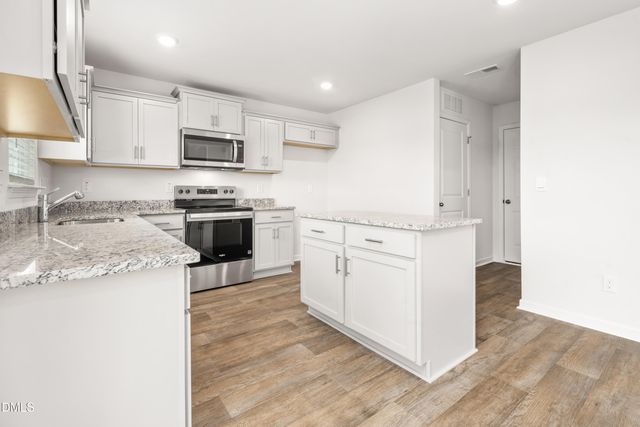 608 Ferio Court, Gibsonville, NC 27249