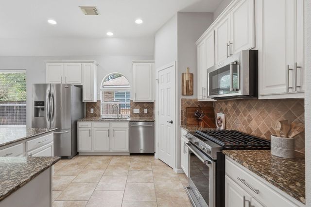 82 S Rocky Point Circle, The Woodlands, TX 77389