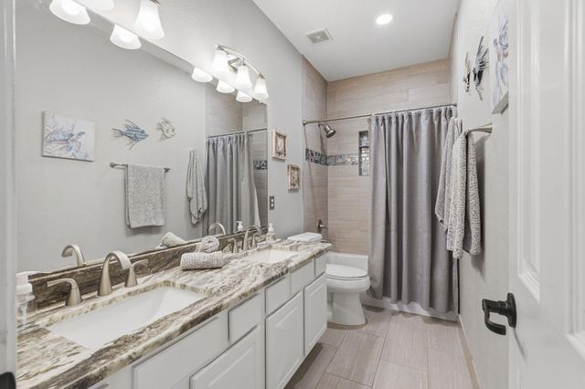 82 S Rocky Point Circle, The Woodlands, TX 77389