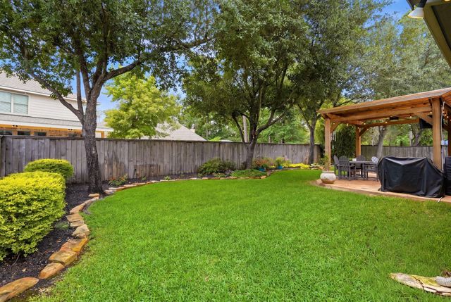82 S Rocky Point Circle, The Woodlands, TX 77389